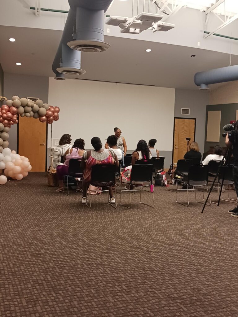 a group of people standing in a room