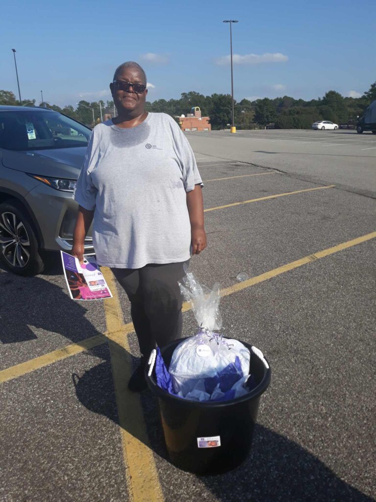 a man standing in a parking lot