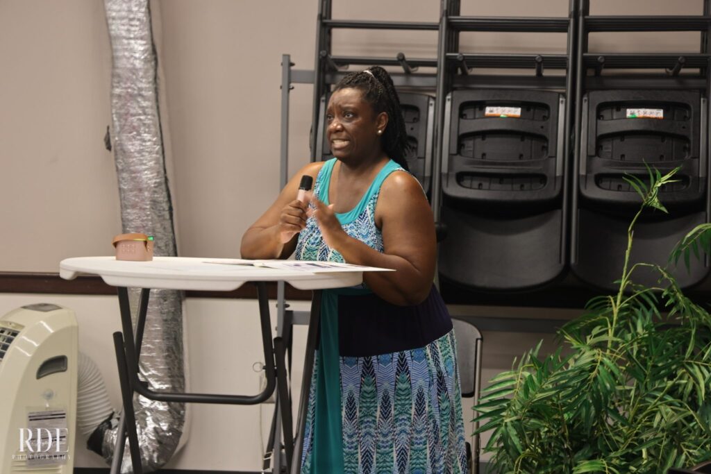 a woman sitting on a table